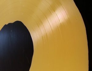 Dried wood glue from cleaning a vinyl record